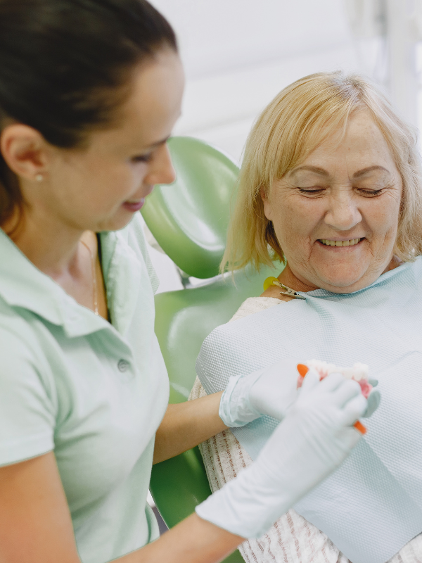 Dental bridge patient smiling at Comprehensive Dental Care in Gainesville, FL