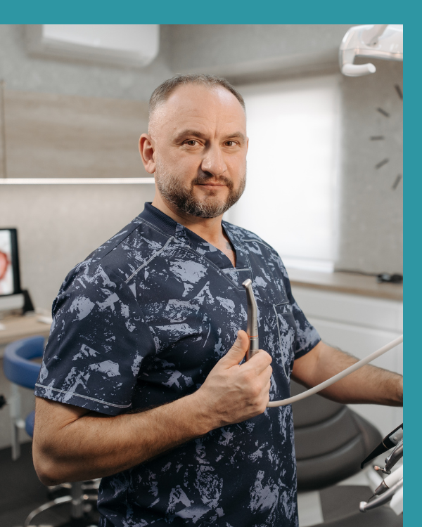 Dental associate reviewing treatment plan with patient