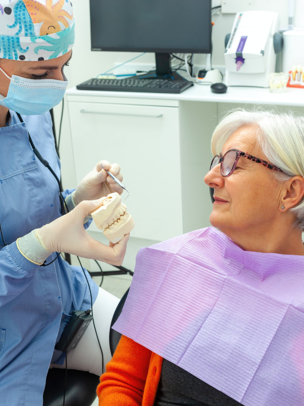 Denture patient smiling at Comprehensive Dental Care in Gainesville, FL